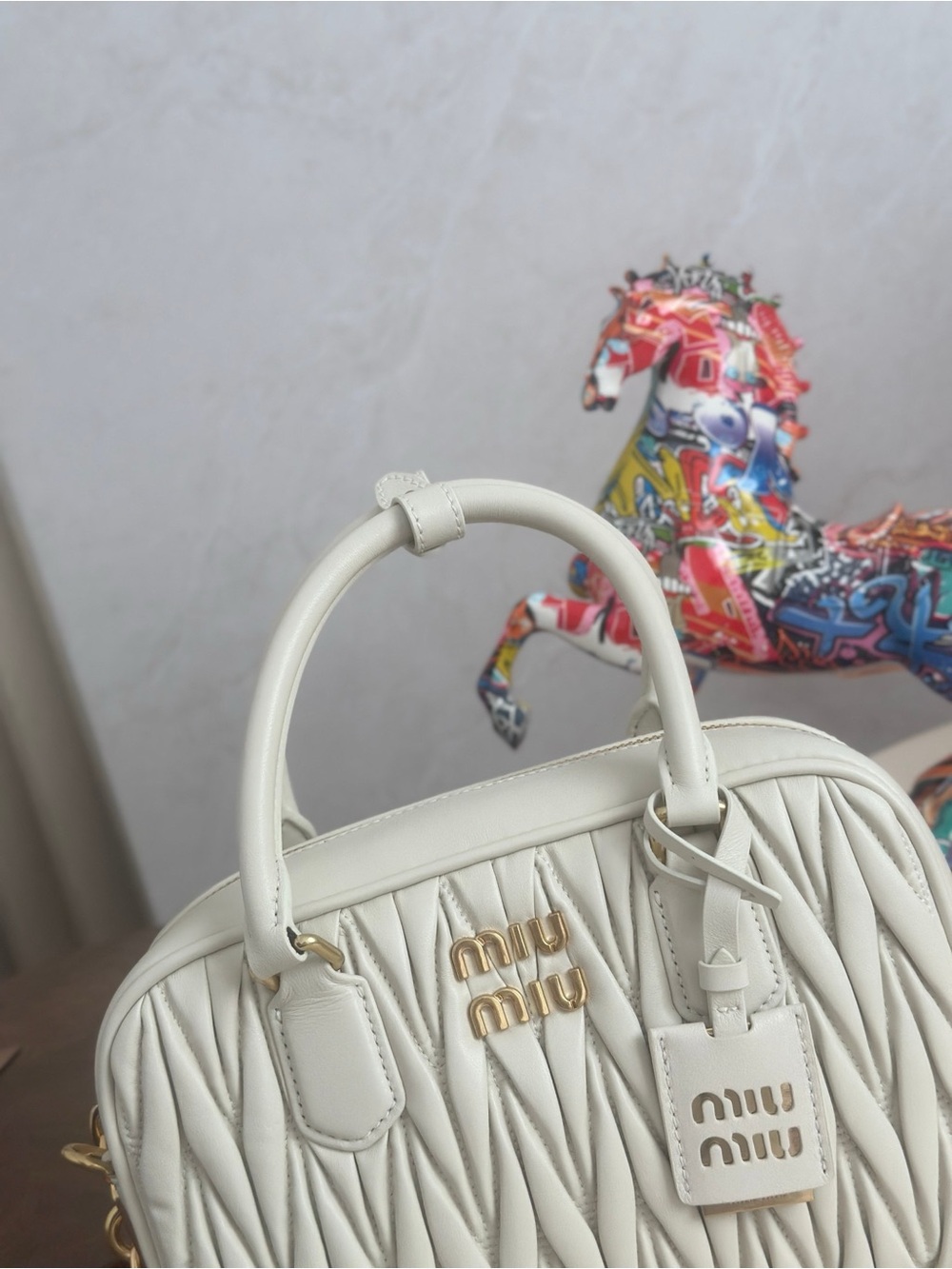 Miu Miu Cream Matelassé Top-Handle Satchel with Gold Hardware